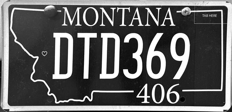 Montana 406 specialty license plate with a heart and the Missoula area code