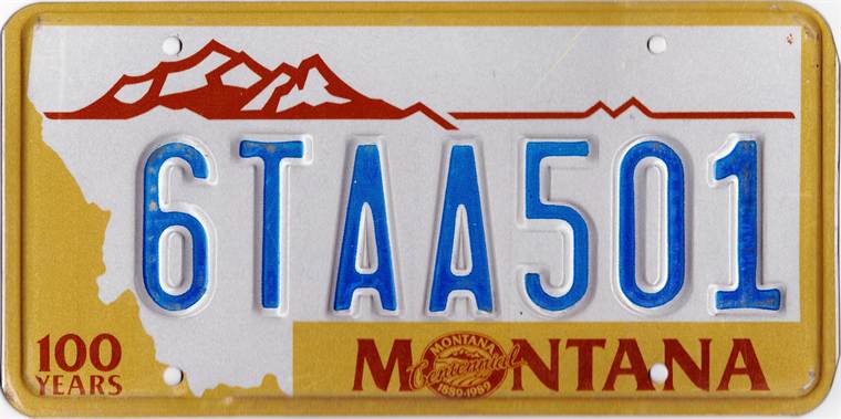 Montana Centennial license plate from 1987 with gold background and 100 years slogan