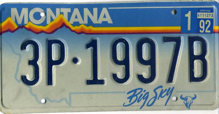 Montana license plate from the 1991 to 2000 design with a mountain range band